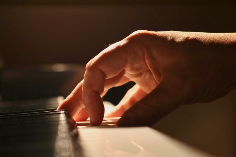 A close-up of a pianist