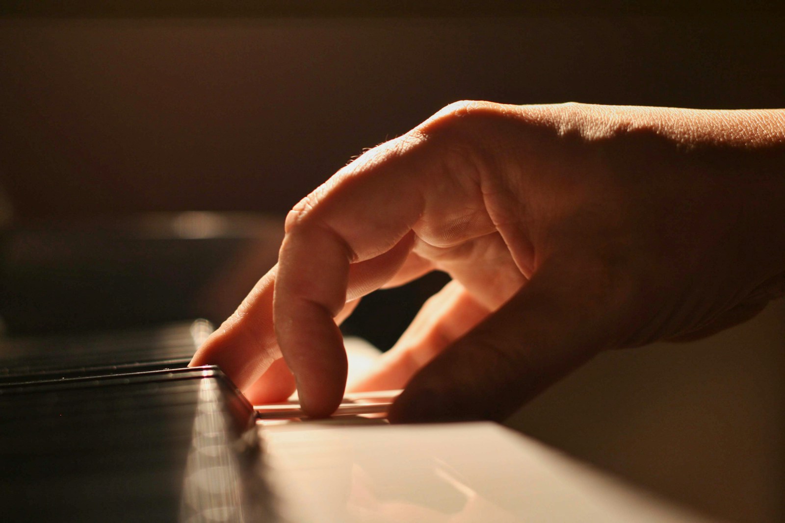 A close-up of a pianist